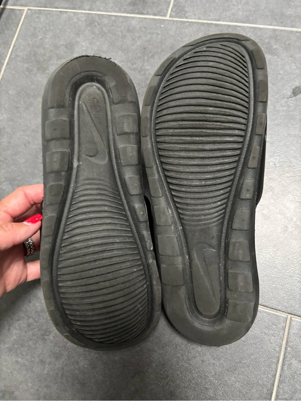Nike Black Slip-On Sandals with Metallic Logo Accent